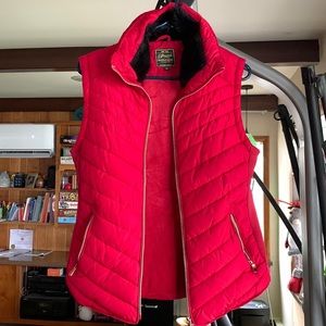 Cozy Vest, worn once.Rich red, black fur lined collar, gold zippers.Very sharp.